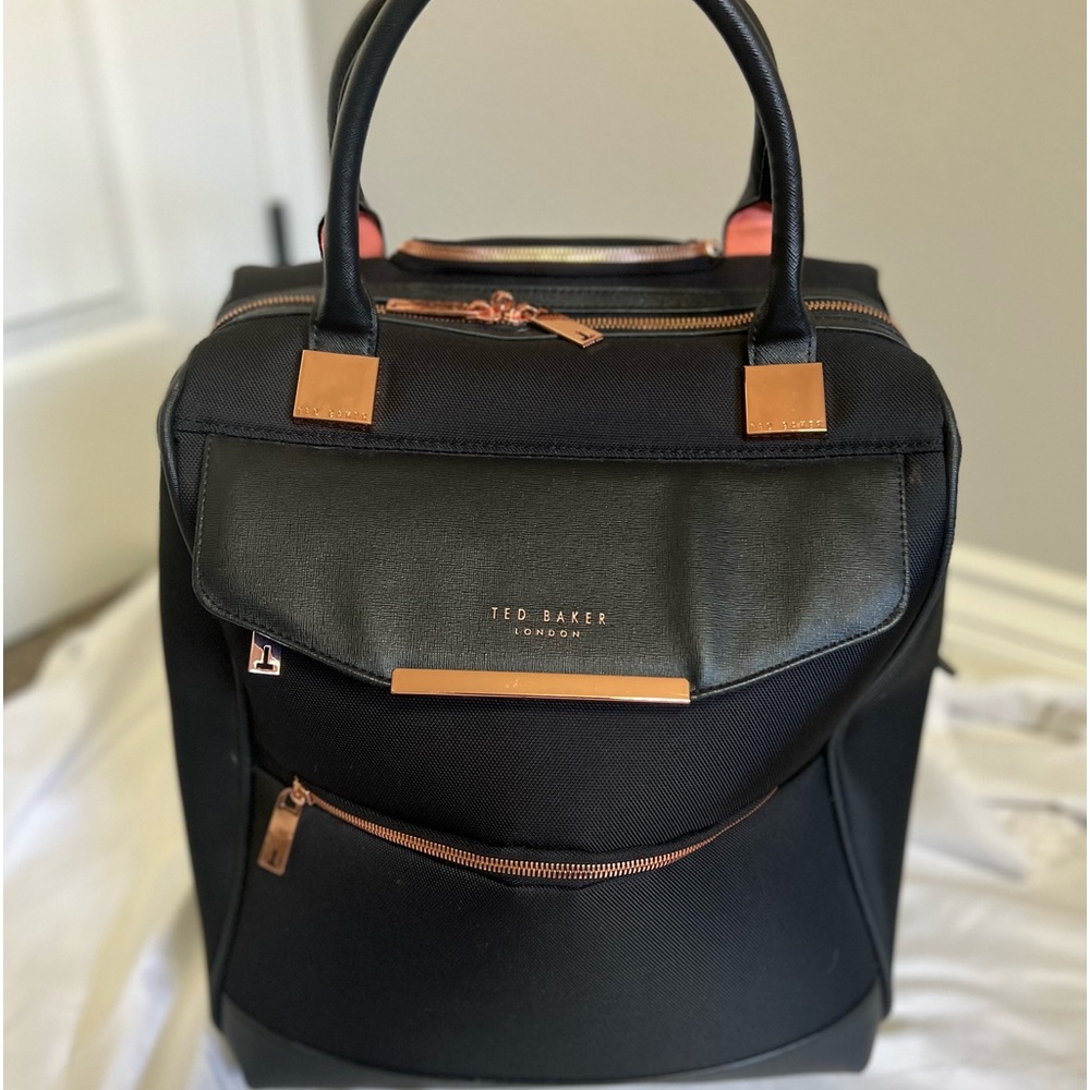 Ted Baker rolling work bag with beautiful vibrant butterfly lining.